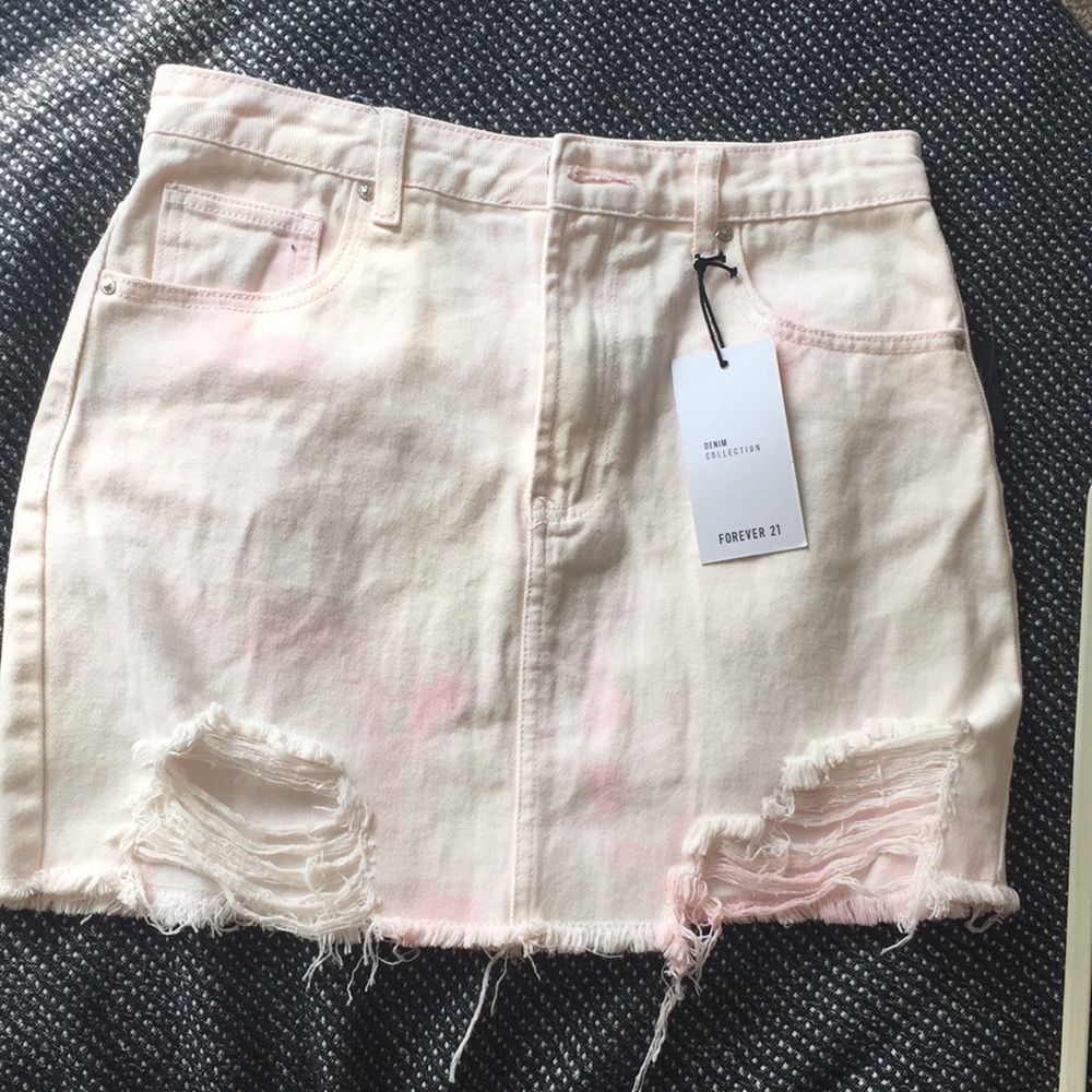 Light pink and white distressed denim skirt
